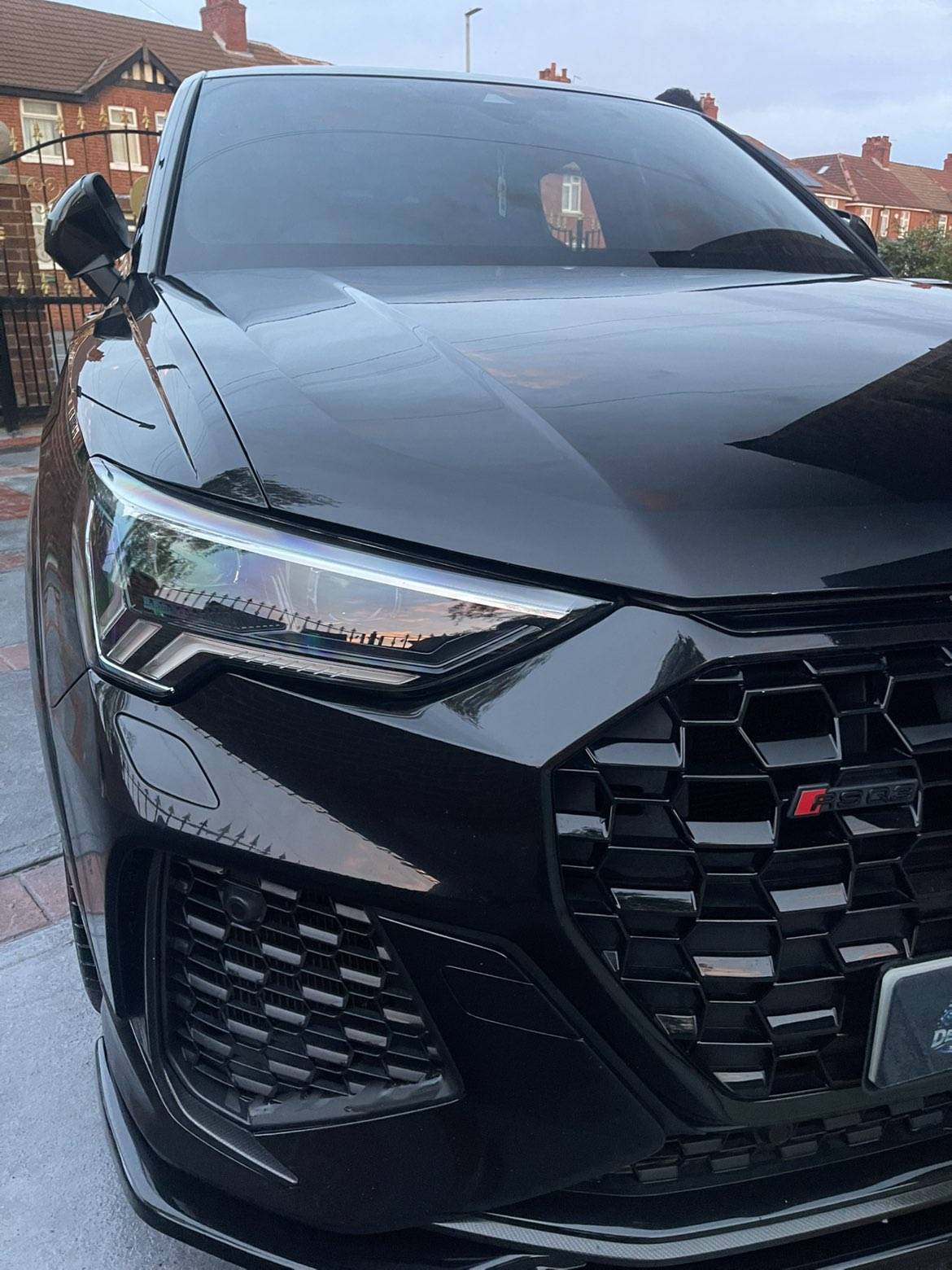 Polished black Audi exterior after detailing