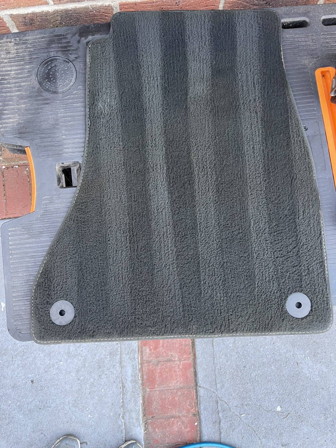 Clean vehicle mat after professional cleaning